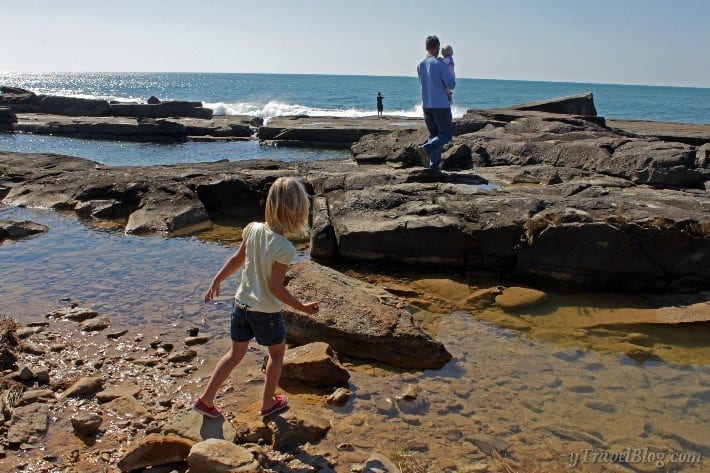 people walking on rocks