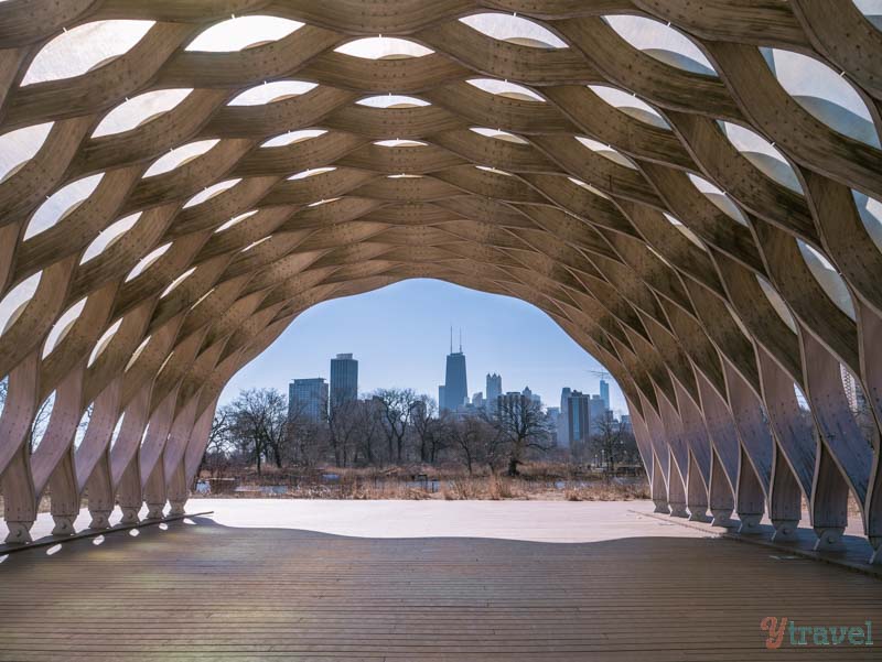 view of buildings under an archway