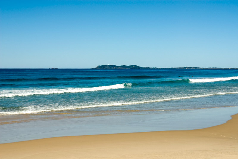 waves rolling onto brunswick heads beach