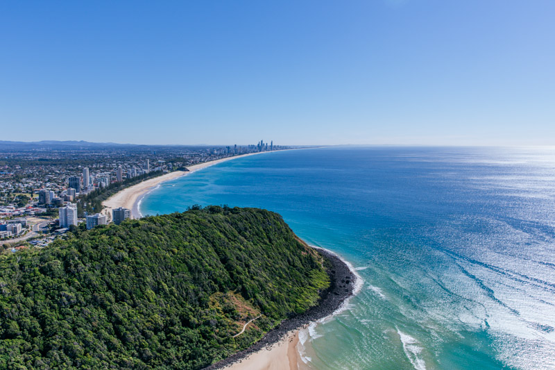 aerial view of burleigh headland over burleigh heads beach