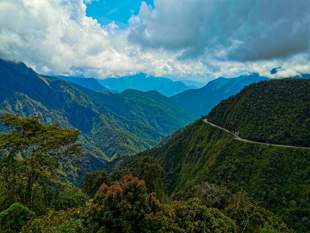 death road winding on the edge of the mountains