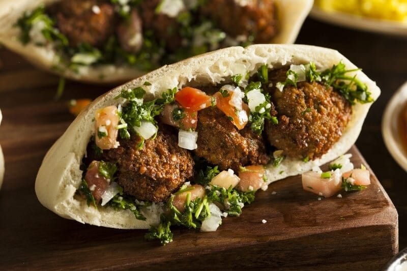 A falafel sandwich on a table