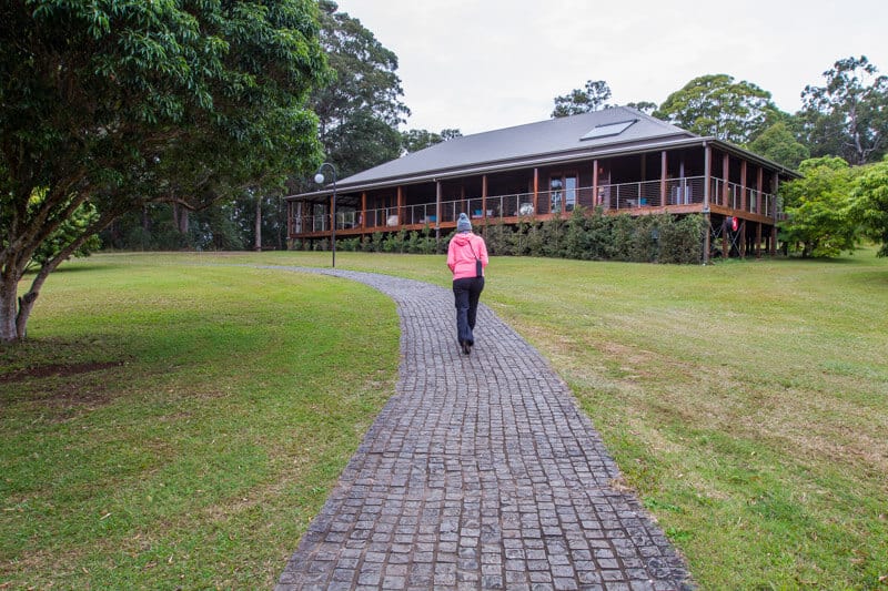 woman walking on a brick path