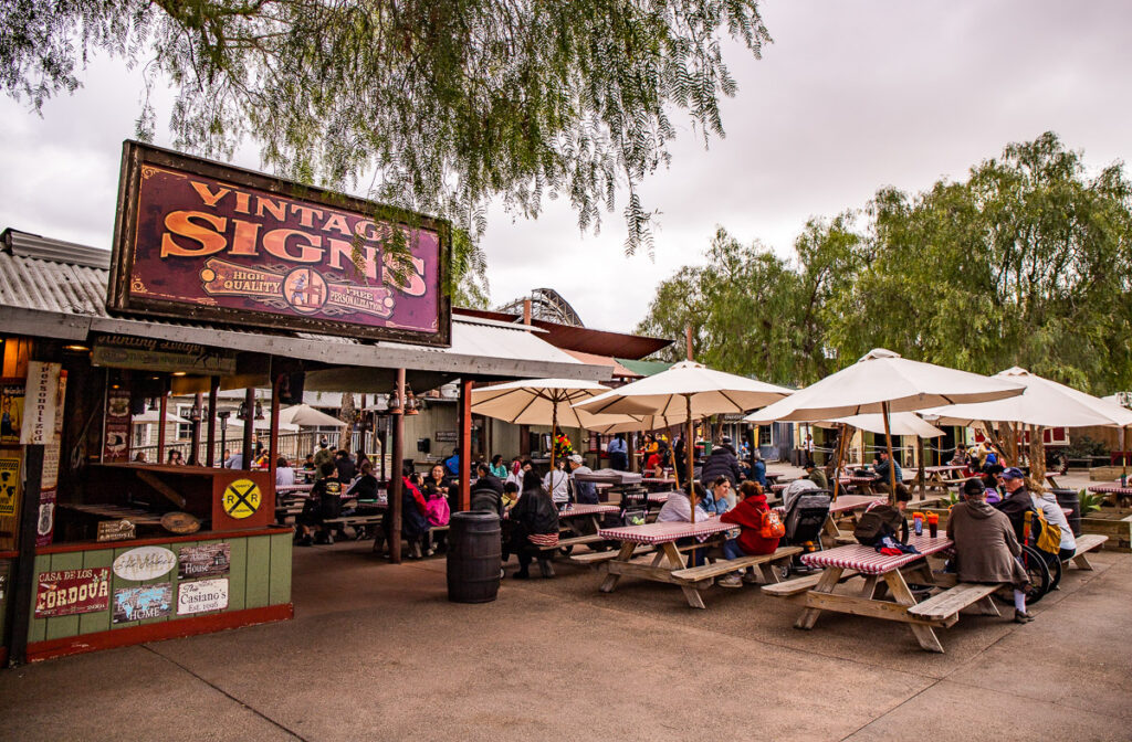 people sitting in beer garden at Firemans BBQ in knotts berry