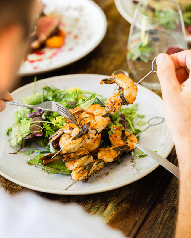 plate of prawn skewers