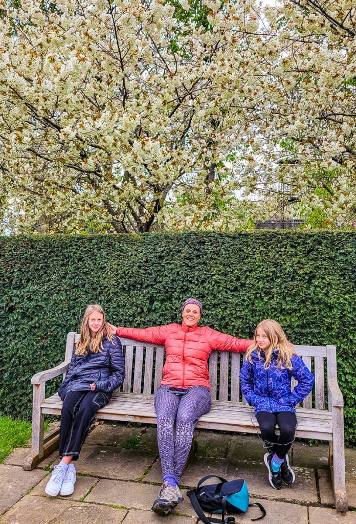 people sitting on a park bench