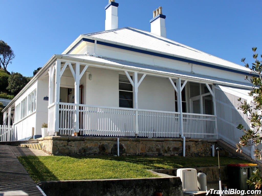 a lighthouse keeper's white cottage