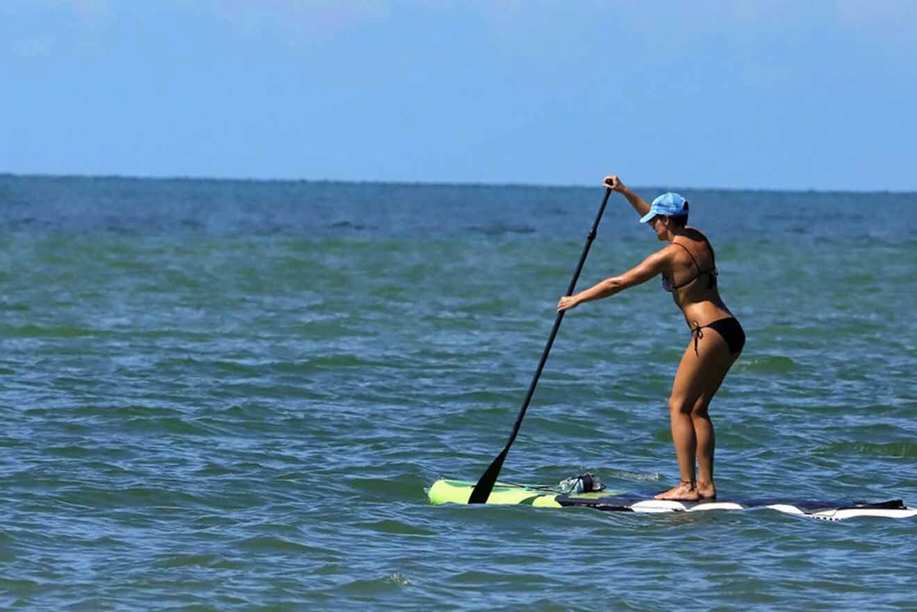 woman paddle boarding 