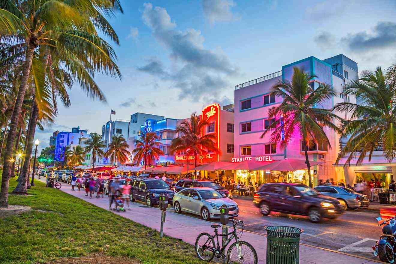 art deco hotels in Miami at night and parked cars