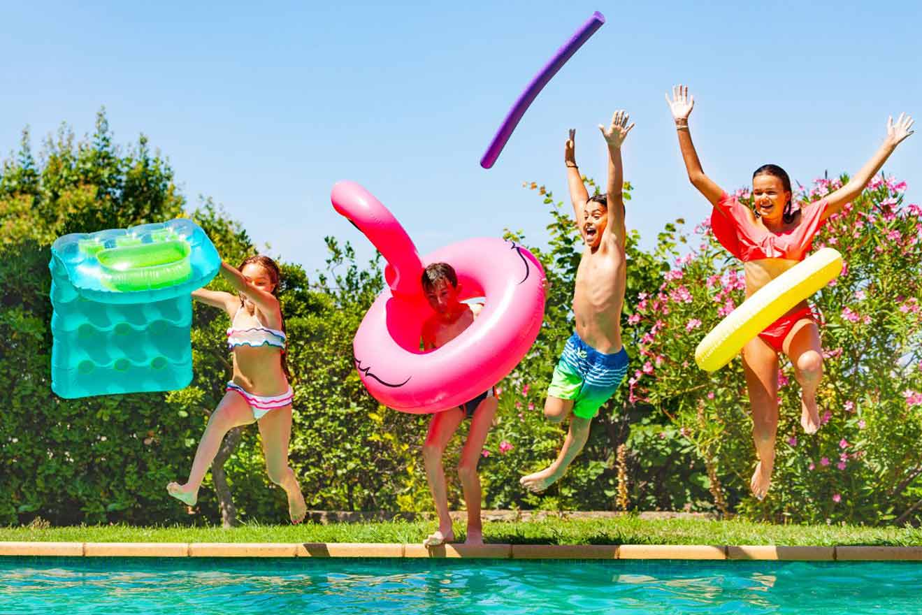 kids jumping in the pool