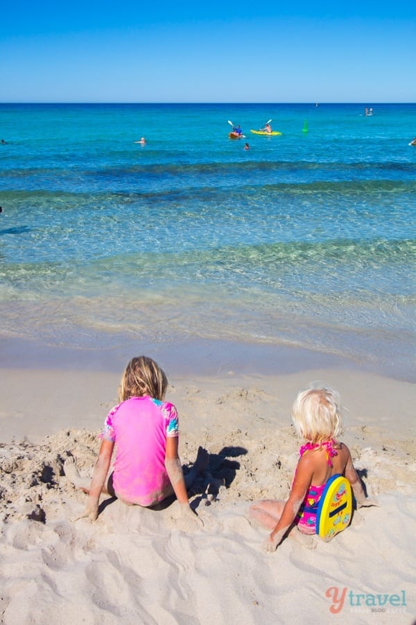 girls playing on sand at Meelup Bay, 