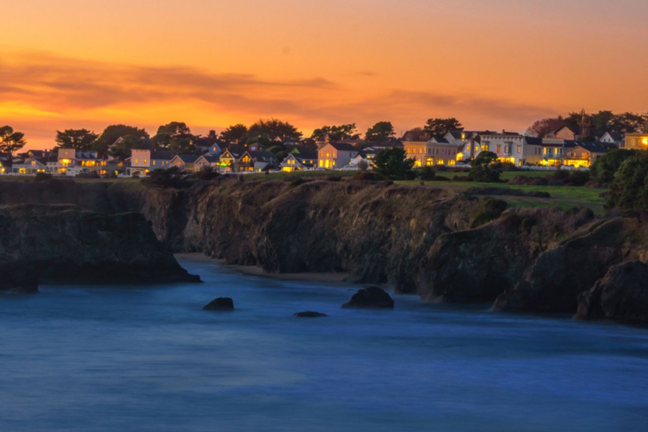 sunset by a cliff and the sea