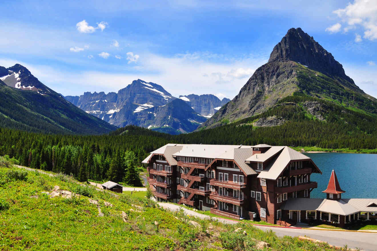 hotel at the mountain with a lake behind