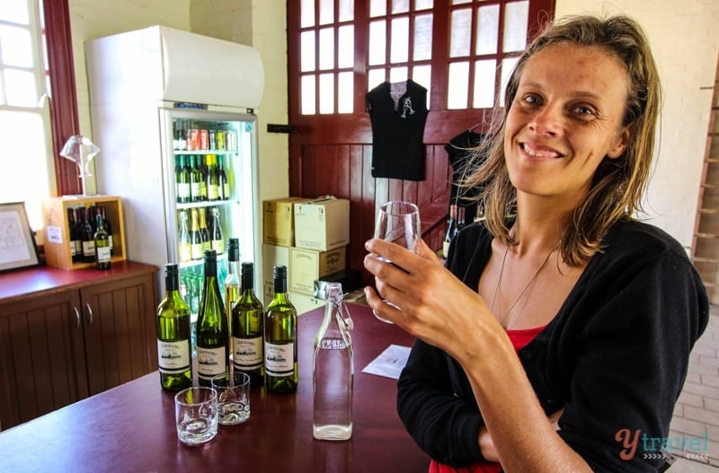 woman tasting wine at Petersons Winery, Armidale