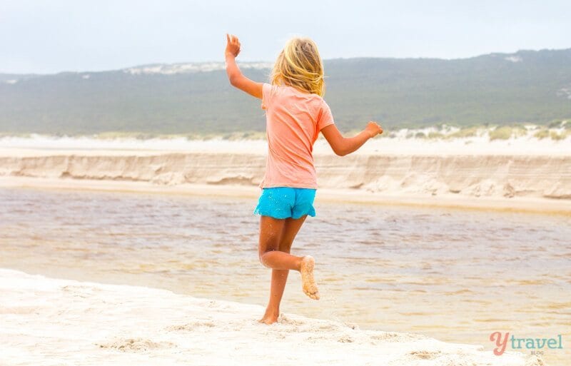 girl running in water D’Entrecasteaux National Park, 