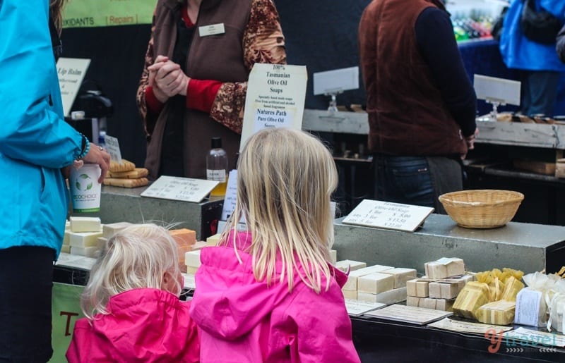 girls looking at soaps on display