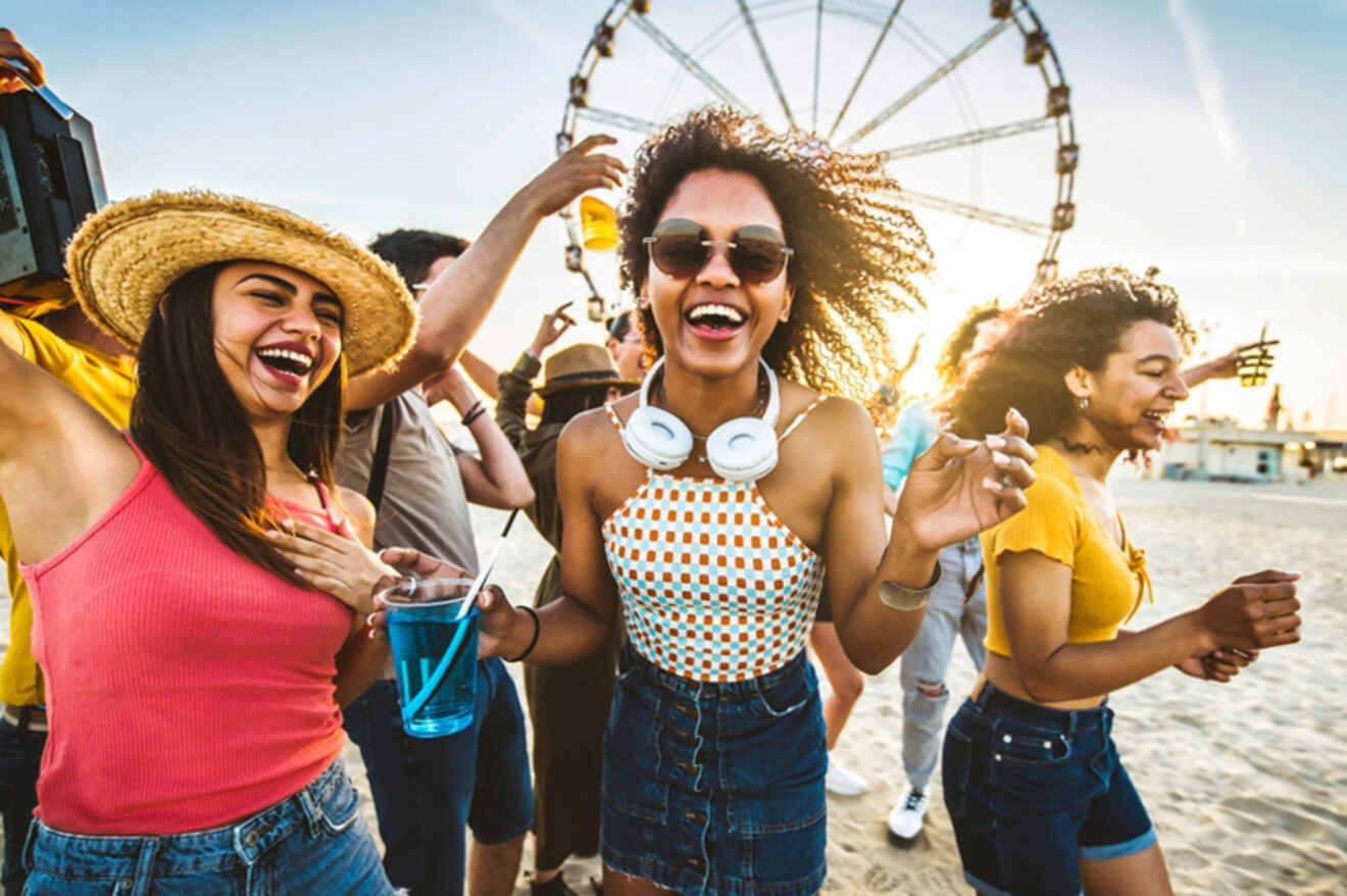 group of friends having fun on the beach