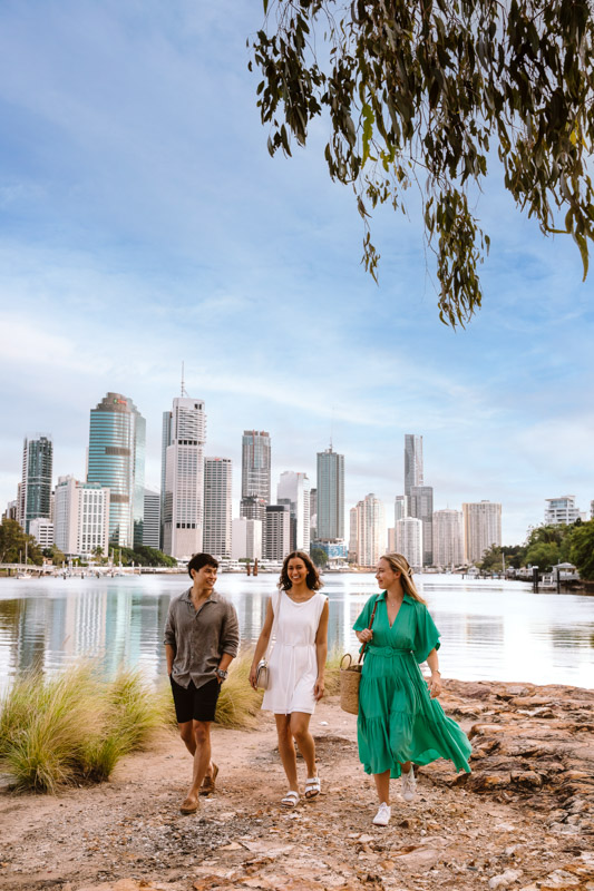 Group of friends walking along the Brisbane Riverwalk 