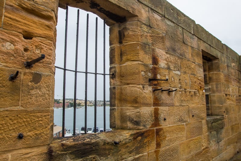 view out of steel bar window in historic stone building