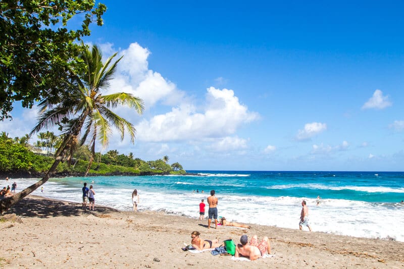 people on sand on Hamoa Beach