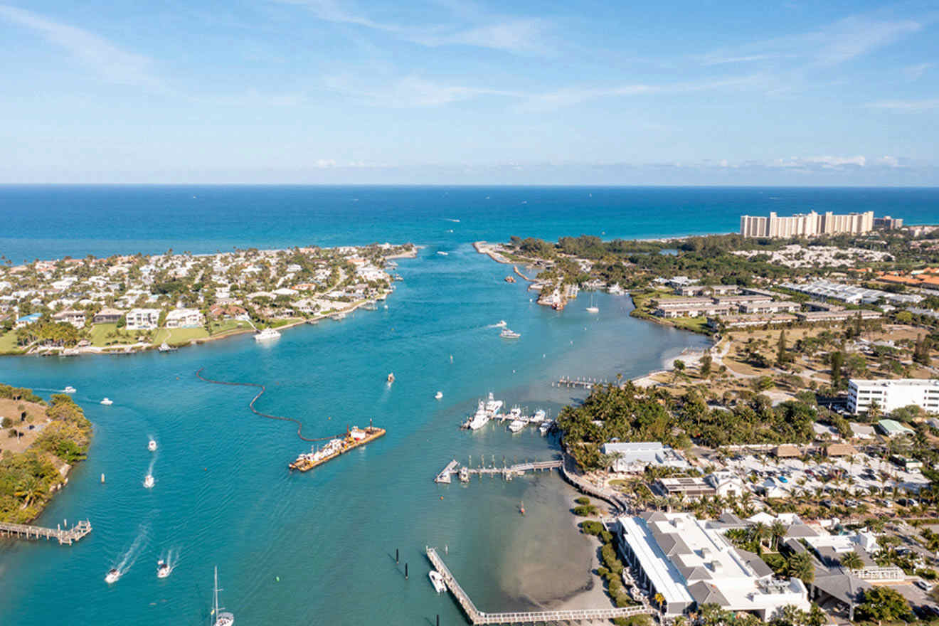 aerial view over Jupiter Beach - harbor, beach, boats