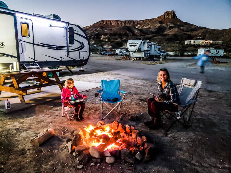 caz and savannahsitting around fire pit at Maverick Ranch RV Park