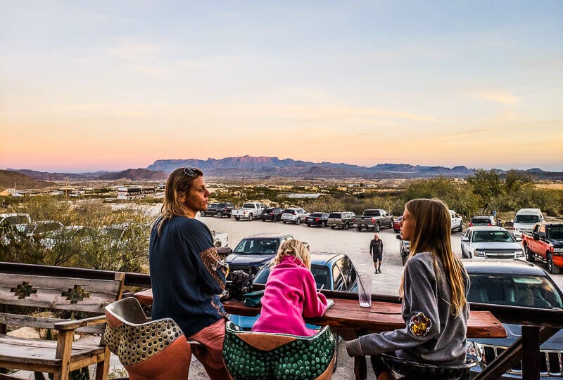 caz and girls looking at sunset from bar deck