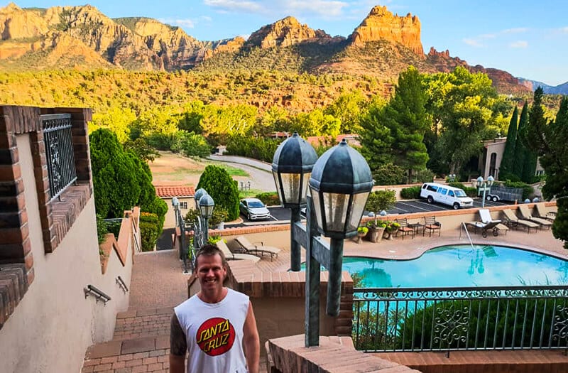 man standing on stairs at Best Western Plus Arroyo Roble Hotel & Creekside Villas