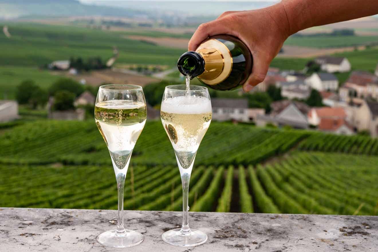 person pouring champagne 