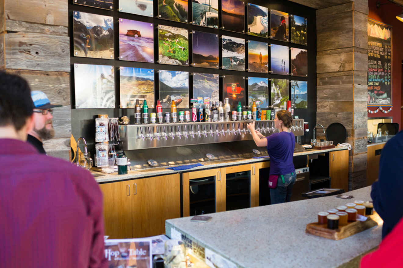 Bar in Portland with bartender pouring drinks