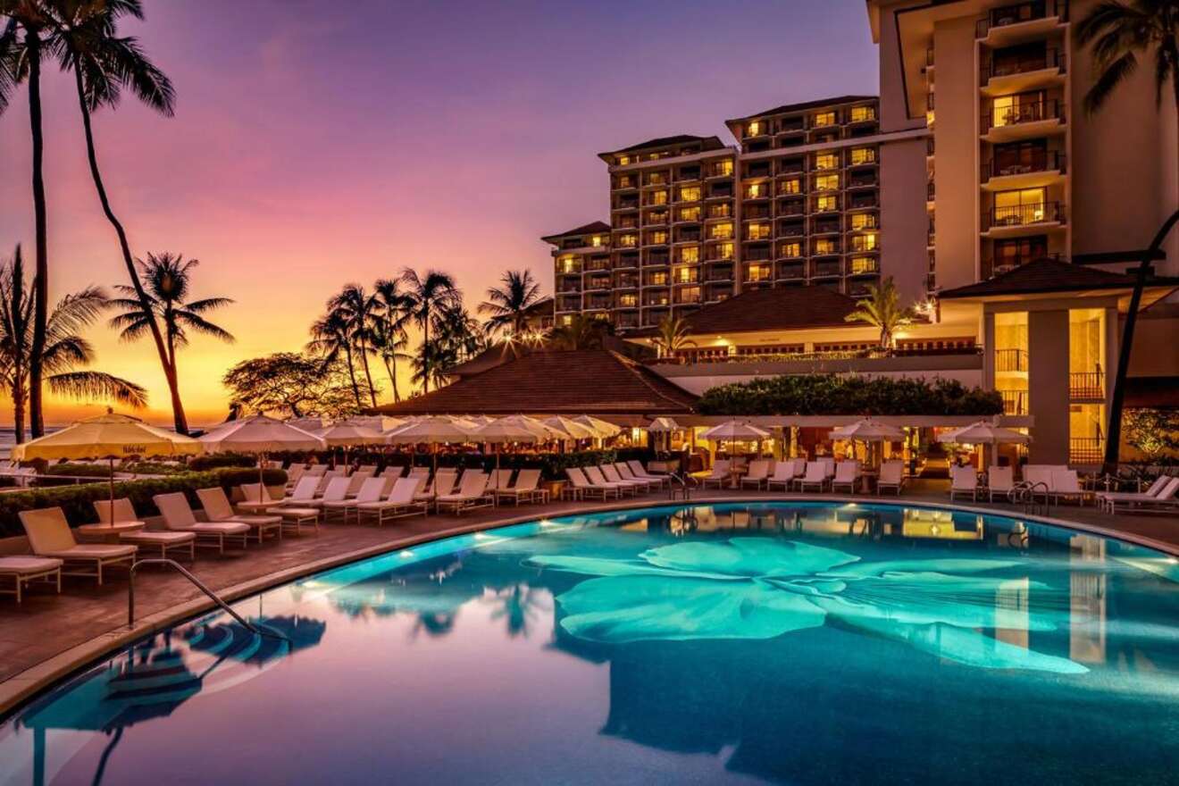 View of the pool and the hotel at sunset