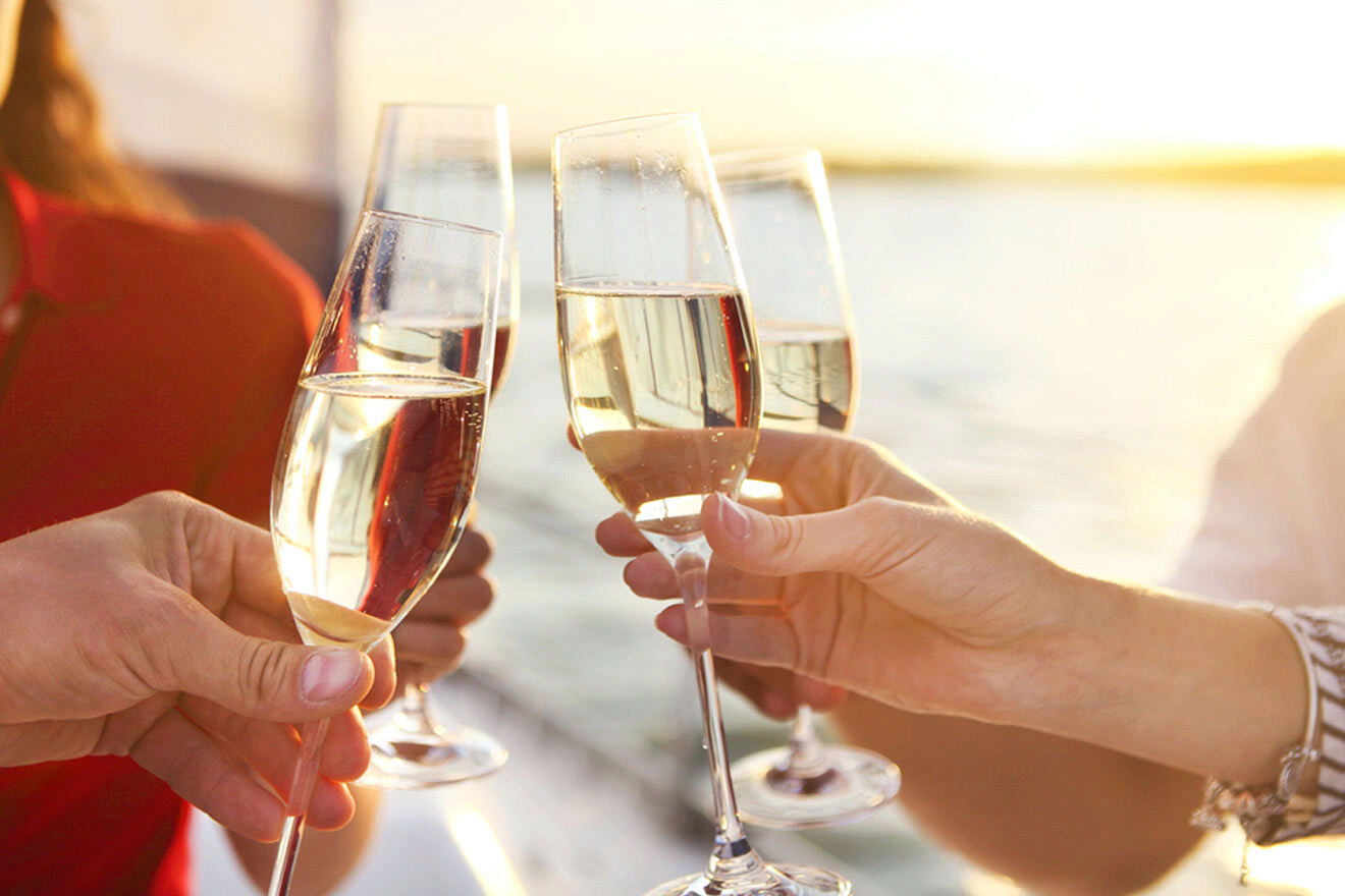 group of friends drinking champagne on a cruise boat