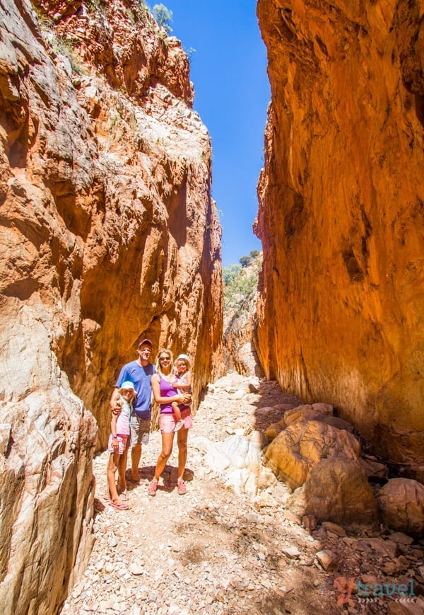 people standing in a canyon