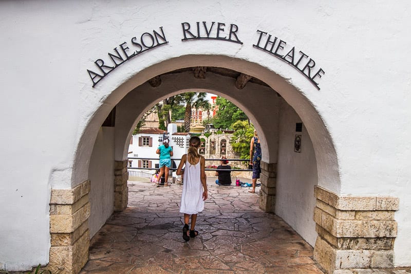 kalray walking under bridge to the anreson river theater