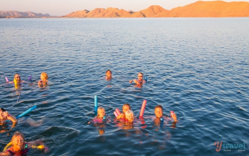 people swimming in lake argyle