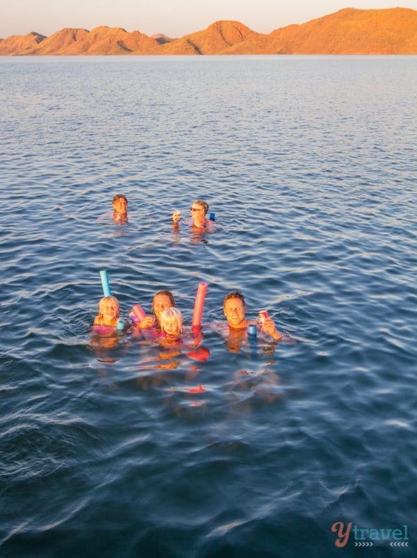 makepeace family swimming in a lake