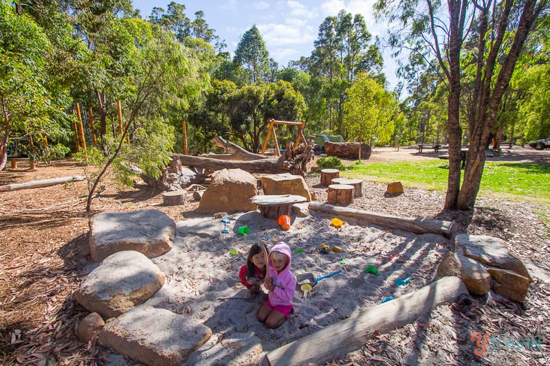 kids playing in sand pit