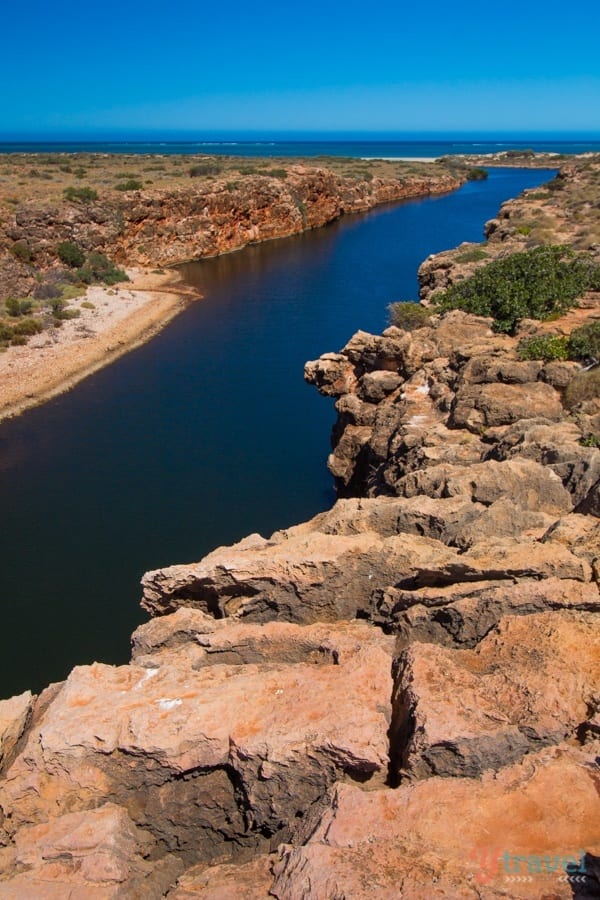 A rocky landscape with a river