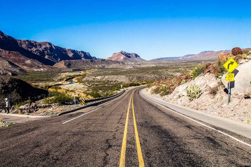 road running through dsert alongside ro grande river in the Big Bend State Park Texas