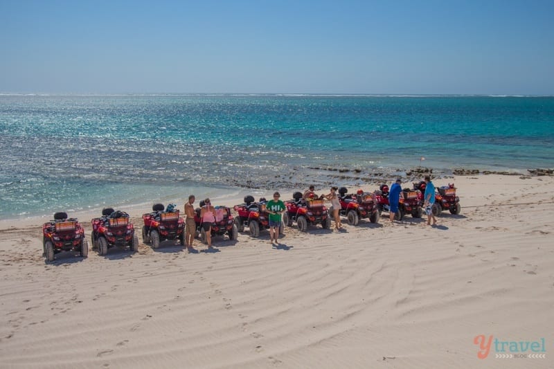 line of the quad bikes on the sand