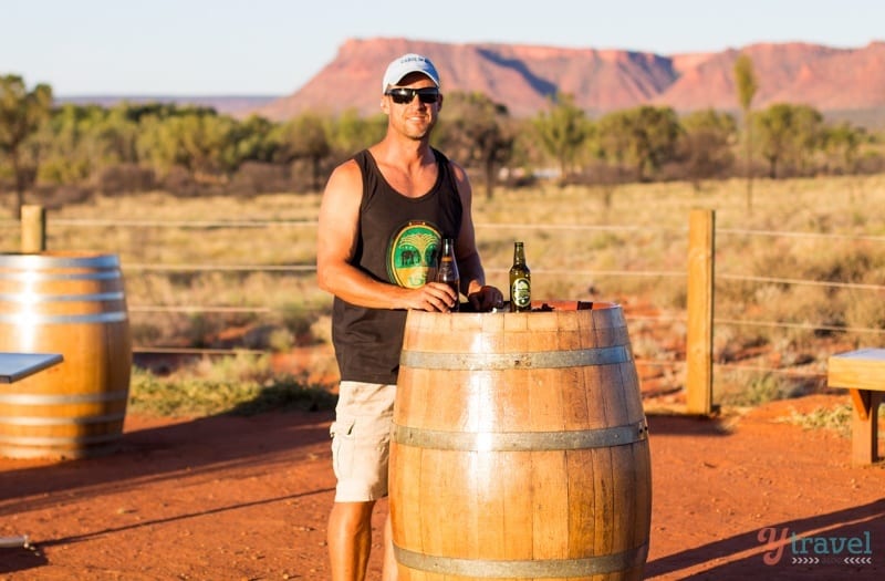 craig drinking a beer on a keg