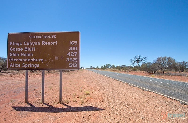 A sign on the side of the road