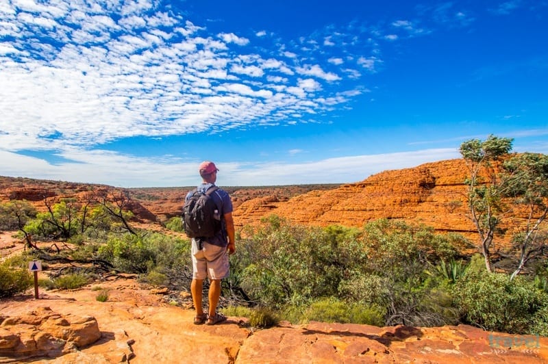 craig standing on a rock cliff