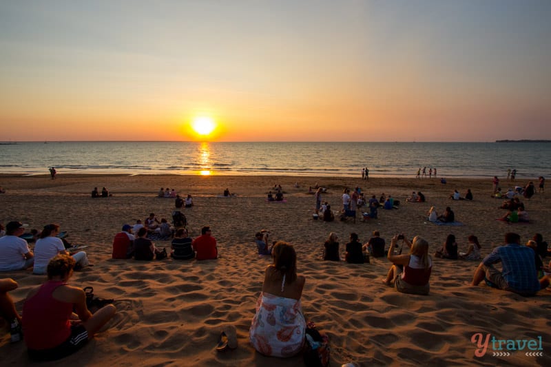 caz looking at orange Sunset at Mindel Beach in Darwin