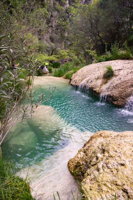 water running past boulders