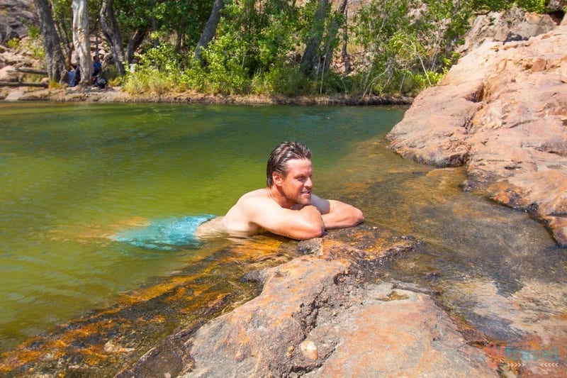 craig in swimming pool looking at view