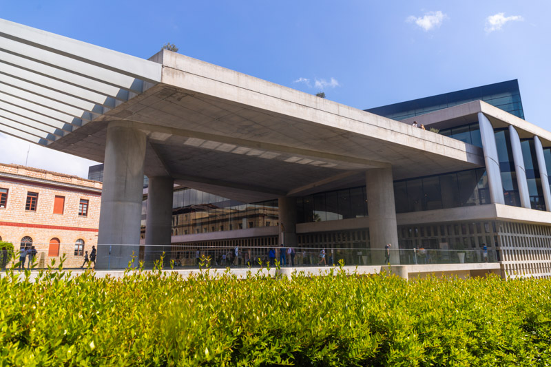 exterior of new acropolis museum with plants out front