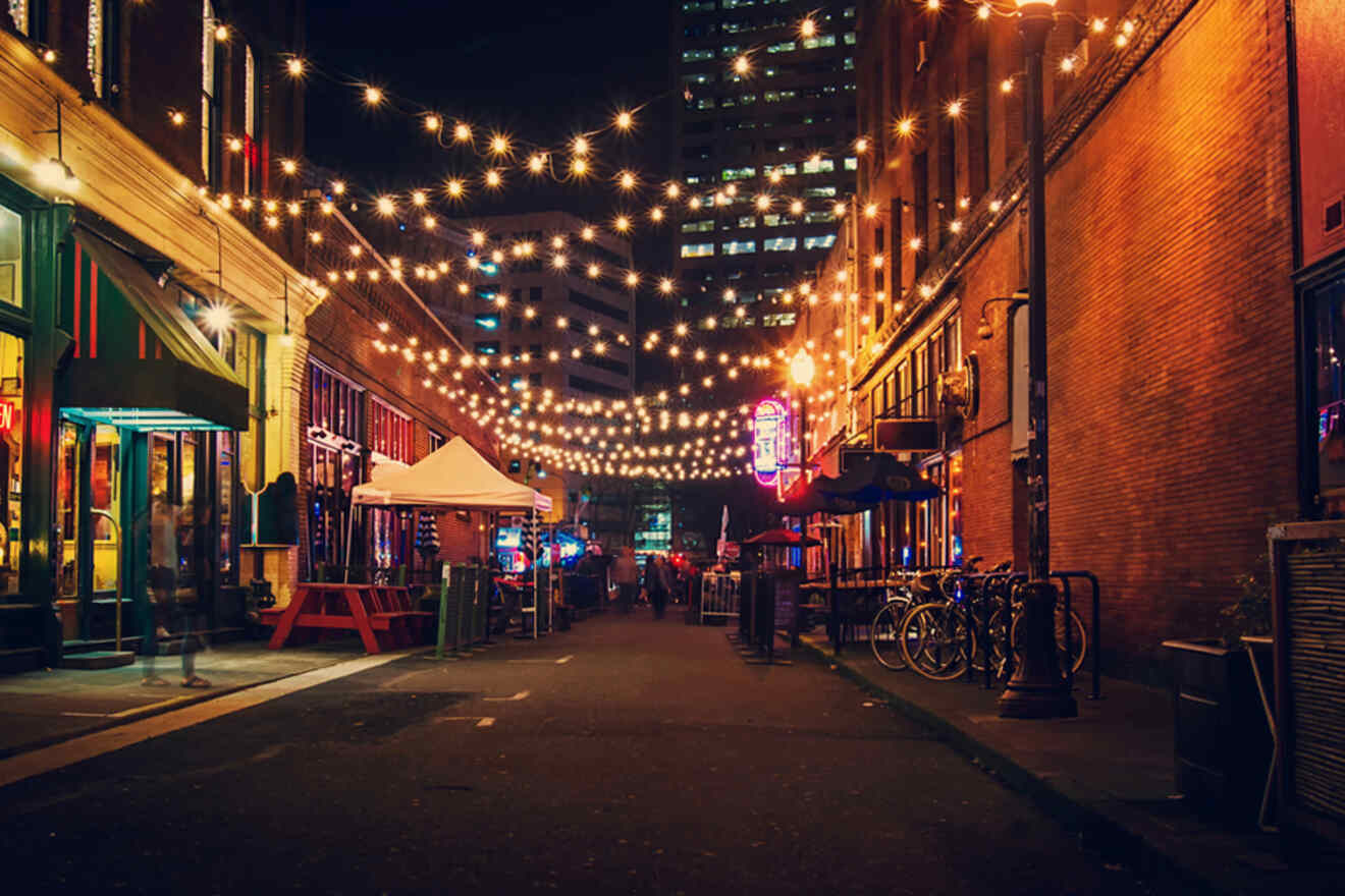 street in downtown Portland lit up by fairy lights in the evening