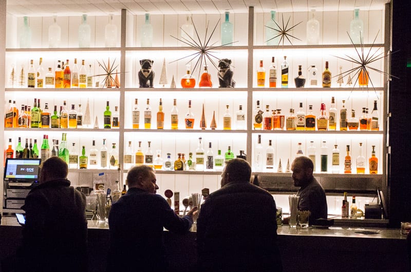 people sitting at a hotel bar