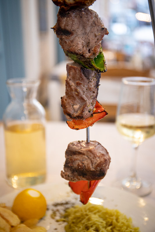 tuna souvlakin on hanging skewer